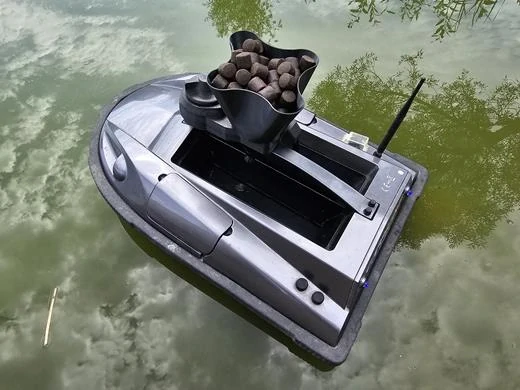 Rozmetadlo WUBS na zavážaciu loďku Carp Scout / Prisma